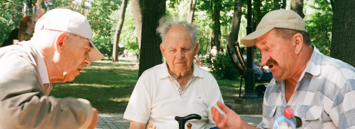 senior citizens playing chess