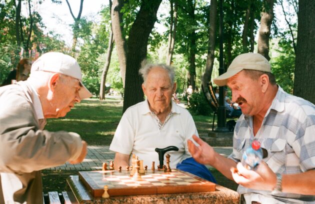 senior citizens playing chess